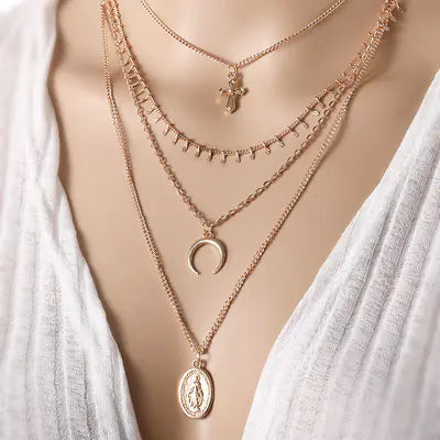 Layered Necklaces with Bird and Feather Designs